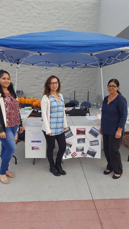 Employees with Puerto Rico collage for hurricane relief